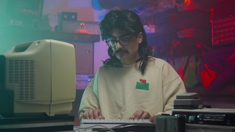 Computer nerd from the '80s or '90s looking right at the camera and giving a thumbs up. Retro scene with vintage colors and atmosphere.