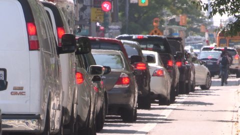 Toronto, Ontario, Canada July 2019 Bike lane on busy city street with car traffic gridlock in Toronto