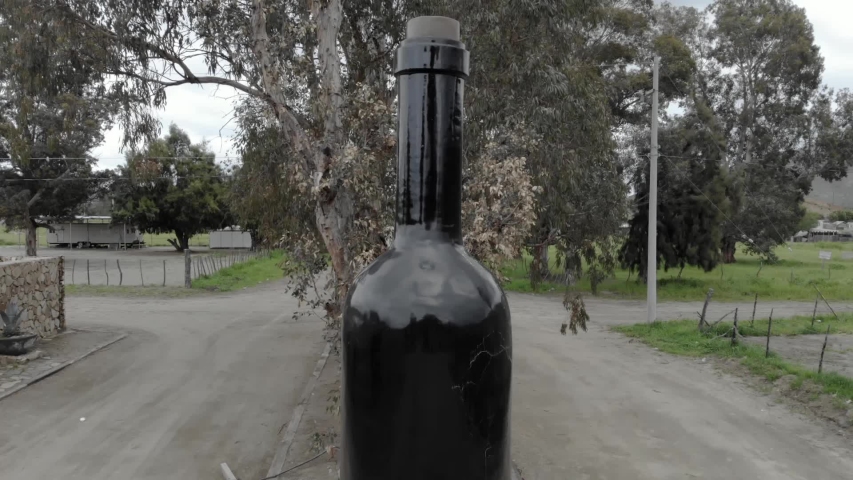Aerial view of a giant glass wine bottle in Baja, México.