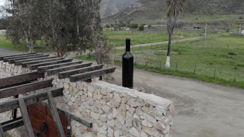 Aerial view of a giant glass wine bottle in Baja, México.