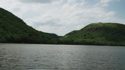 View from the motorboat on the river in motion