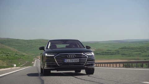 Cluj Napoca / Romania - 04 26 2018: Front shot of an Audi A8 driving on a road