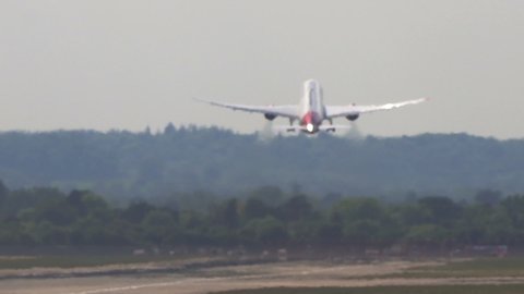 London Heathrow, United Kingdom - 05 12 2019: Super-telephoto plane takes off with heat shimmer 2