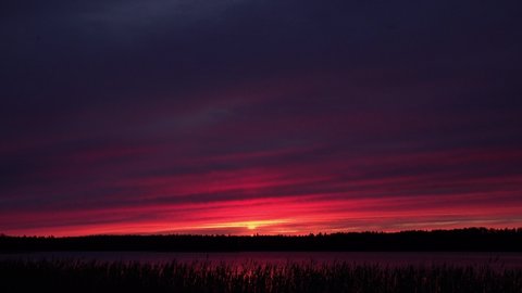 Red sunset on the lake