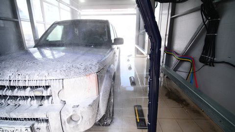 NOVOCHERKASSK, RUSSIA – JANUARY 2019: Automatic non-contact car wash washes the car inside the box