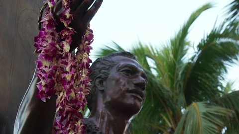 Honolulu , Hawaii / United States - 12 26 2018: Hawaiian statue wearing necklaces