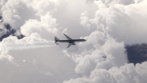 Airplane flying above the clouds