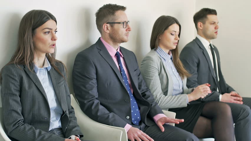 Nervous businesspeople waiting for interview
 Royalty-Free Stock Footage #10348058