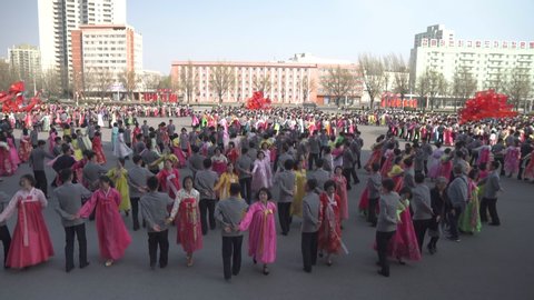 Pyongyang / North Korea - 04 14 2019: Mass dance at Day of the Sun in Pyongyang in Democratics Peoples Republic of Korea DPRK (North Korea)