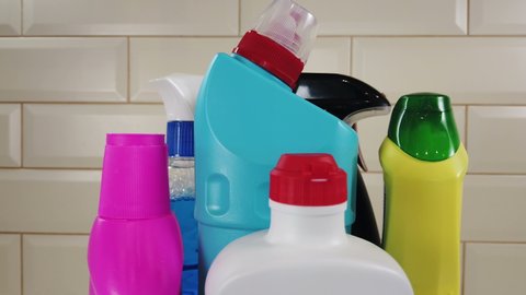 different products and items for cleaning on the floor in the kitchen. Concept cleaning. Rotation video