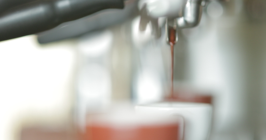 Fresh espresso pull coming out of italian coffee machine  | Shutterstock HD Video #1034818928