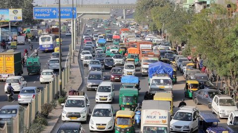 Delhi/ India - 09.02.2019:very dense city car and motorcycle traffic in the evening, aerial view