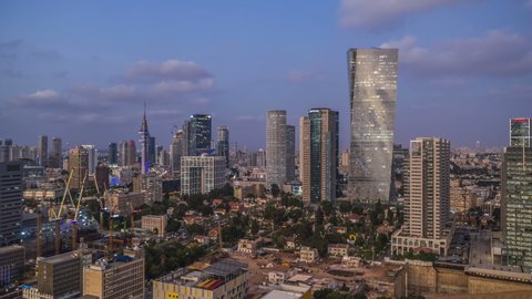 Tel Aviv - Israel 10.04.2017: Tel Aviv city center day to night aerial hyper lapse 4k