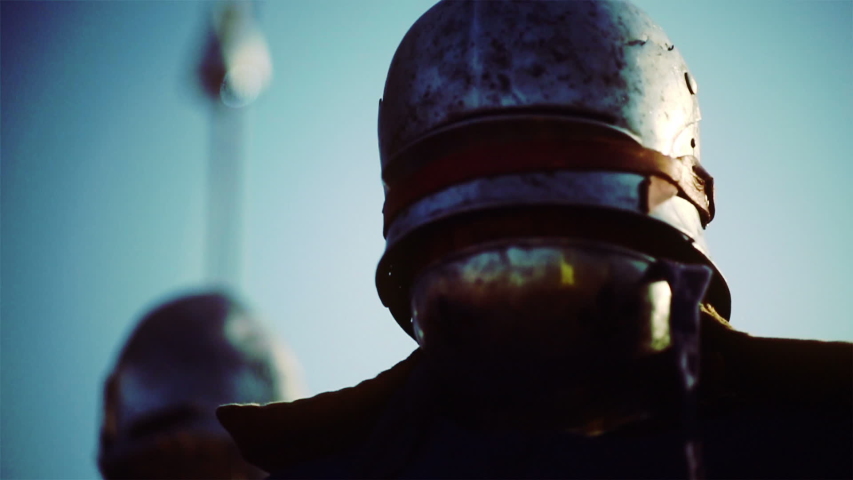 Knights medieval battle reconstruction. Blurred motion.