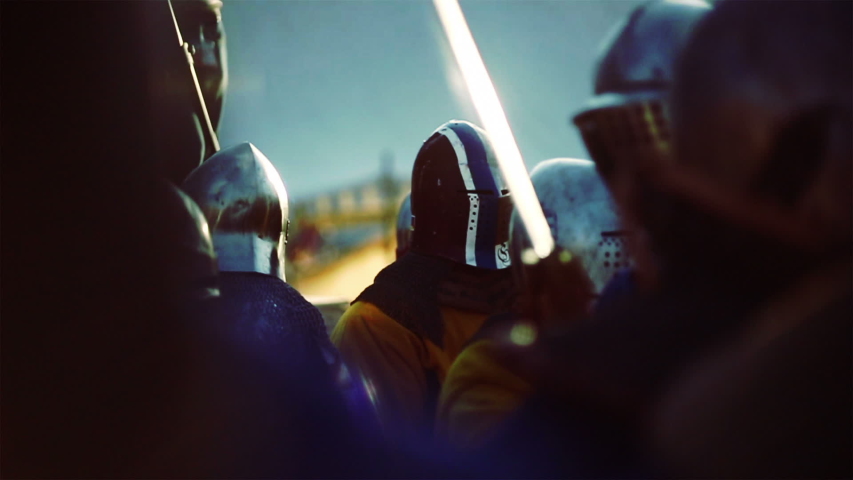 Knights medieval battle reconstruction. Blurred motion.