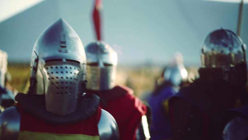 Knights medieval battle reconstruction. Blurred motion.