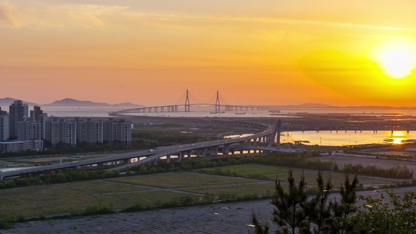Timelapse 4k. Sunset of incheon bridge at Songdo Central Park,South Korea