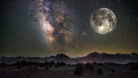 Full Moon orbiting through fantastic starry sky above snowy mountains - Powered by Shutterstock - Get 15% off with code: PIKWIZARD15