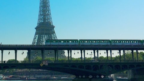 Metro train over Bir-Hakeim bridge and the Eiffel Tower - Paris - France