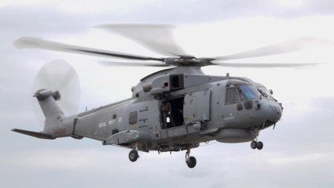 Yeovilton, Somerset, UK - July 13 2019: A Royal Navy AgustaWestland AW101 Merlin HM2 Helicopter at the Royal Naval Air Station (RNAS) Yeovilton (HMS Heron) in Somerset, England,UK