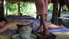 Slow motion clip of massage by feet 