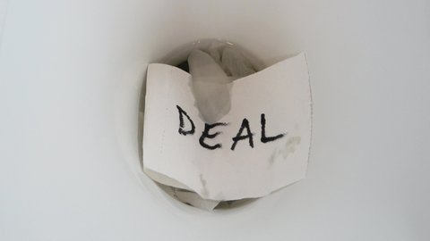 Deal text toilet paper flush. Flushing white toilet paper with text deal. Written with black color