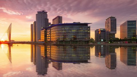 manchester city salford quays timelapse from day to night england uk