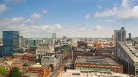 manchester city skyline pan timelapse aerial view sunny day england uk