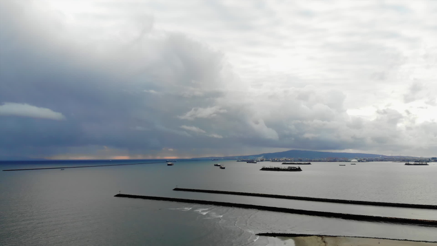 Drone capture of the shores in Long Beach, CA on a cloudy day.