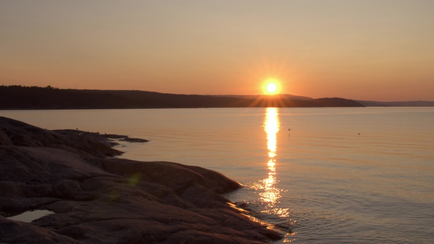 Sunset by water in Sundsvall, Sweden