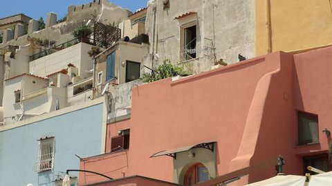 Procida Island. Naples, Italy. Village of Marina Corricella, Procida Island, Mediterranean Sea, near Naples. The characteristic houses with colored facades. Typical fishing village.