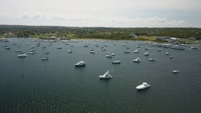 Aerial drone shot orbiting around an anchorage filled with boat at Block Island, Rhode Island