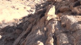 HD resolution high quality clear sunny summer morning video footage of bright red granite boulders rocky desert landscape, plains area around it, remote horizons and wast endless plains