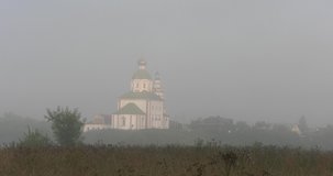 4K high quality foggy early summer morning video of Suzdal churches, buildings, hills, fields and cathedrals located on shore of Kamenka River in Vladimir Oblast in eastern Russia 220 km from Moscow