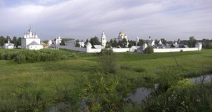 4K high quality sunny early summer morning video of Suzdal churches, buildings, hills, fields and cathedrals located on shore of Kamenka River in Vladimir Oblast in eastern Russia 220 km from Moscow