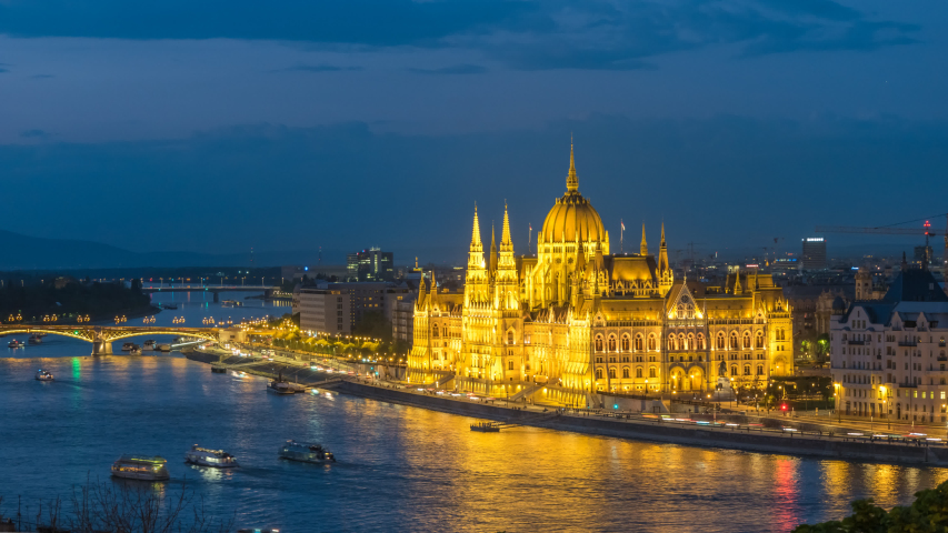 Budapest Hungary time lapse 4K, city skyline night timelapse at Hungarian Parliament and Danube River