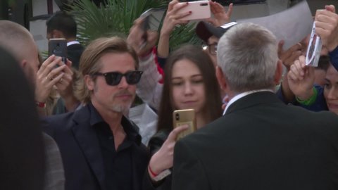 London, England - Tuesday 30th July 2019 Brad Pitt greeting fans at the London Premiere of Once Upon A Time In Hollywood