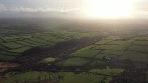 Sun setting over Welsh fields
