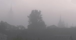 4K high quality foggy early summer morning video of Suzdal churches, buildings, hills, fields and cathedrals located on shore of Kamenka River in Vladimir Oblast in eastern Russia 220 km from Moscow