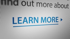 Mouse Cursor Clicking "Learn More" Text Link .
 - Powered by Shutterstock - Get 15% off with code: PIKWIZARD15