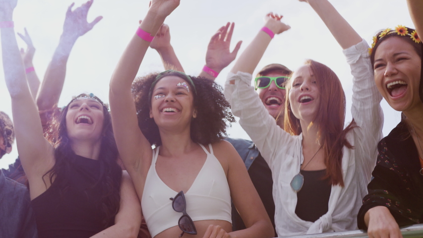 Group Of Young Friends Dancing Behind Barrier At Outdoor Music Festival Royalty-Free Stock Footage #1035129818