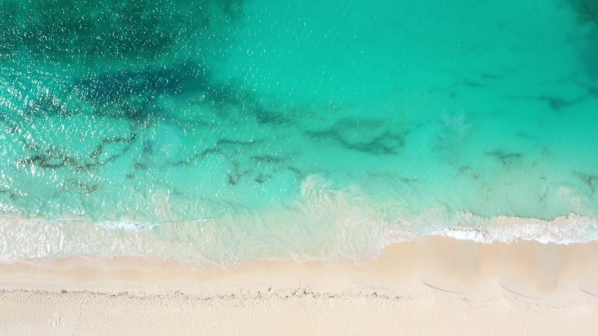 Aerial view from drone on caribbean sea with waves. Travel destinations. Summer holidays | Shutterstock HD Video #1035157481