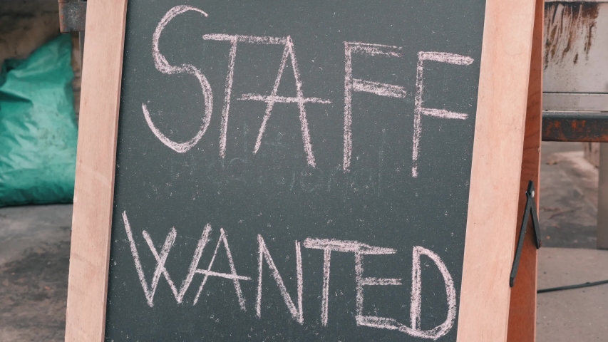 Staff wanted chalk board sign. Vacancy sign on black chalkboard. Headhunter concept. Job hire concept. Royalty-Free Stock Footage #1035173846