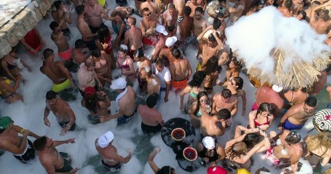 Budva / Montenegro - 03 15 2019: party people at a pool in Budva Montenegro Adlı Haber Amaçlı Stok Video