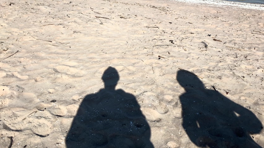 girl's shadow beach saying goodbye her Stock Footage Video (100% ...