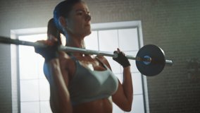Athletic Beautiful Woman Does Overhead Deadlift with a Barbell in the Gym. Gorgeous Female Professional Bodybuilder Workout Weight Lift Exercises in the Authentic Fit Training Facility. Zoom in - Powered by Shutterstock - Get 15% off with code: PIKWIZARD15