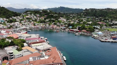 St. Georges / Grenada - 05 18 2019: St. Georges Grenada Harbor Fly In Shot