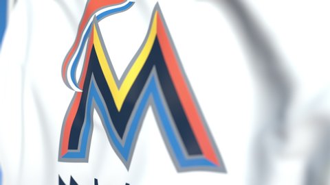 Waving flag with Miami Marlins team logo, close-up. Editorial loopable 3D animation