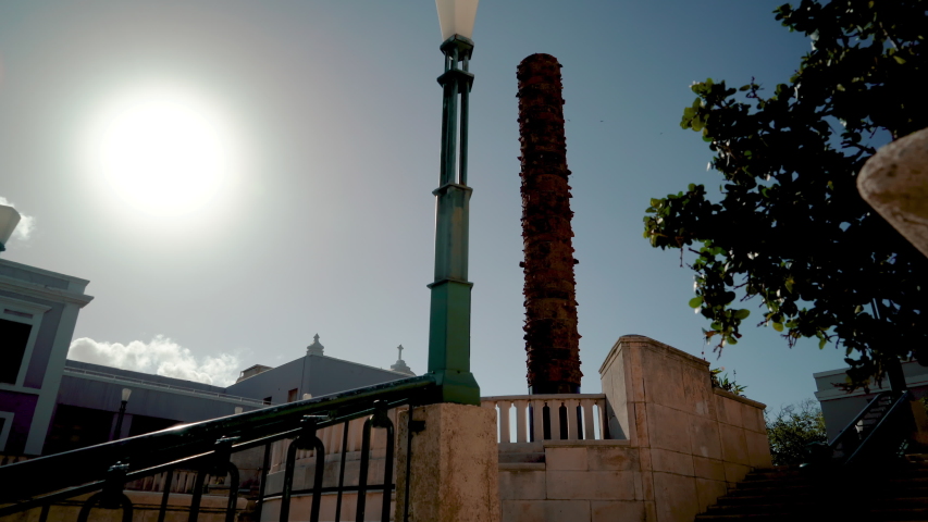 The Totém Telúrico, at the top of the steps at Plaza del Quinto Centenario, Viejo San Juan, Puerto Rico, on a sunny day.