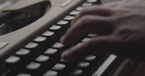 Man Typing on Old Retro Typewriter. Close up Shot 4K